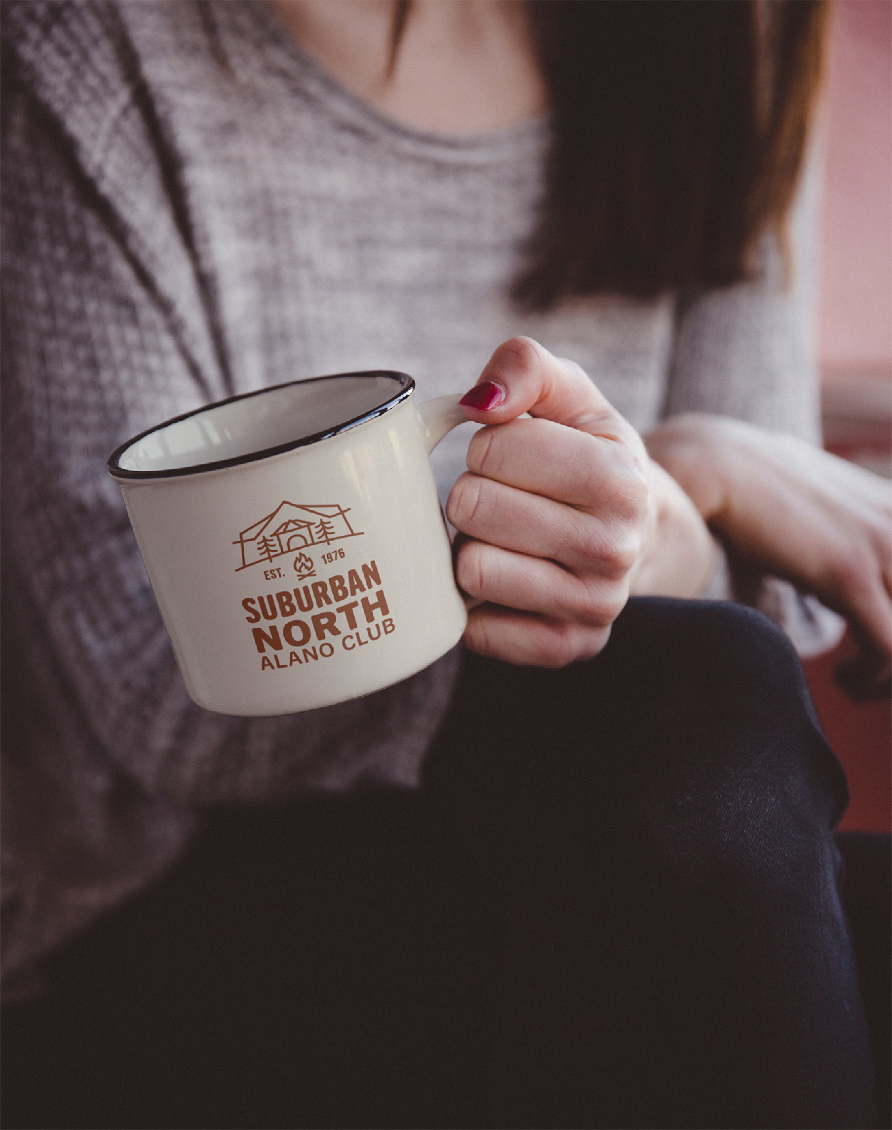 coffee sna club woman holding coffee cup with logo